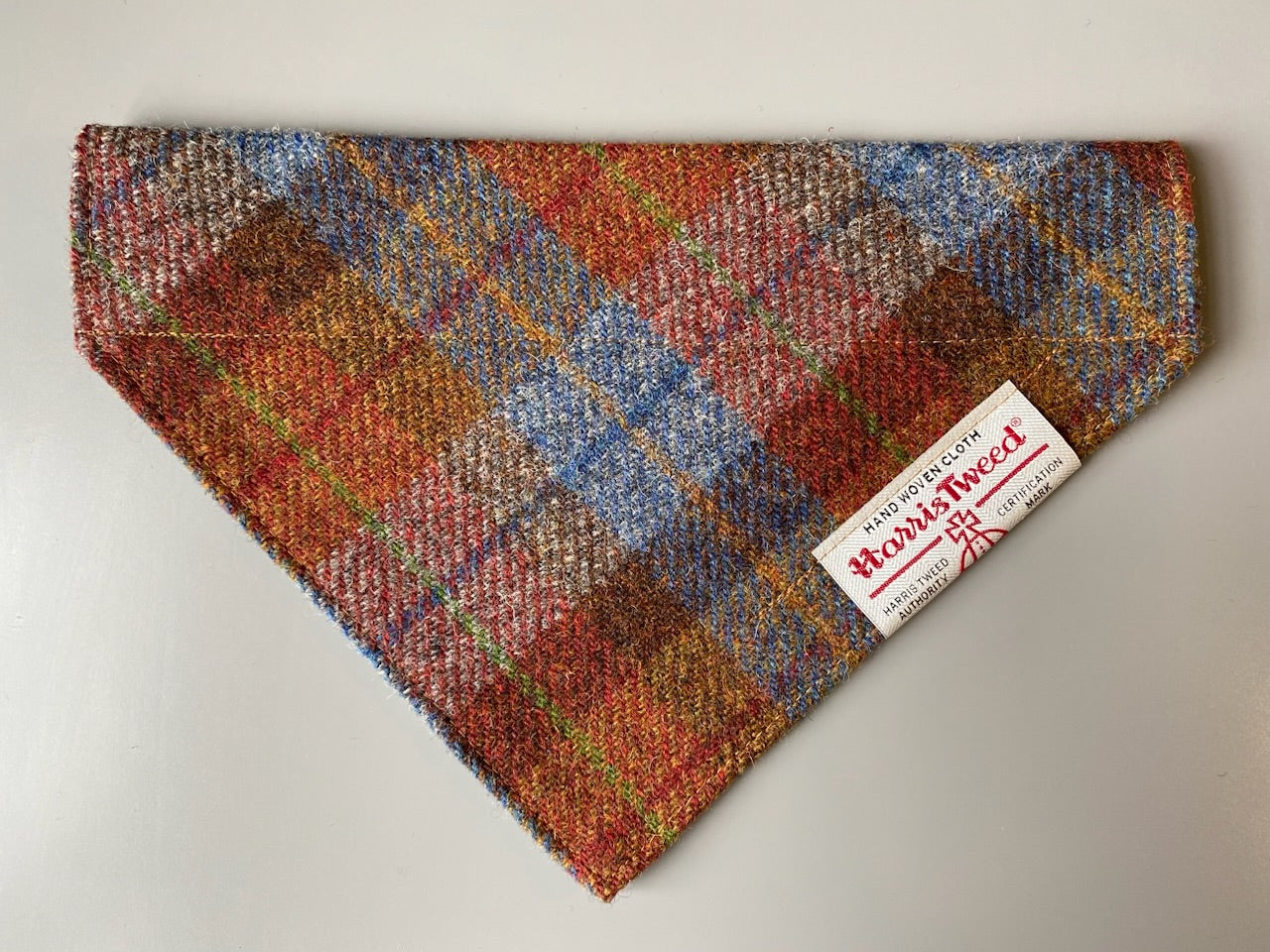 Harris Tweed dog bandana neckerchief in rust orange, blue & brown check tartan or plaid pattern. Sizes S, M, L + XL pet scarf