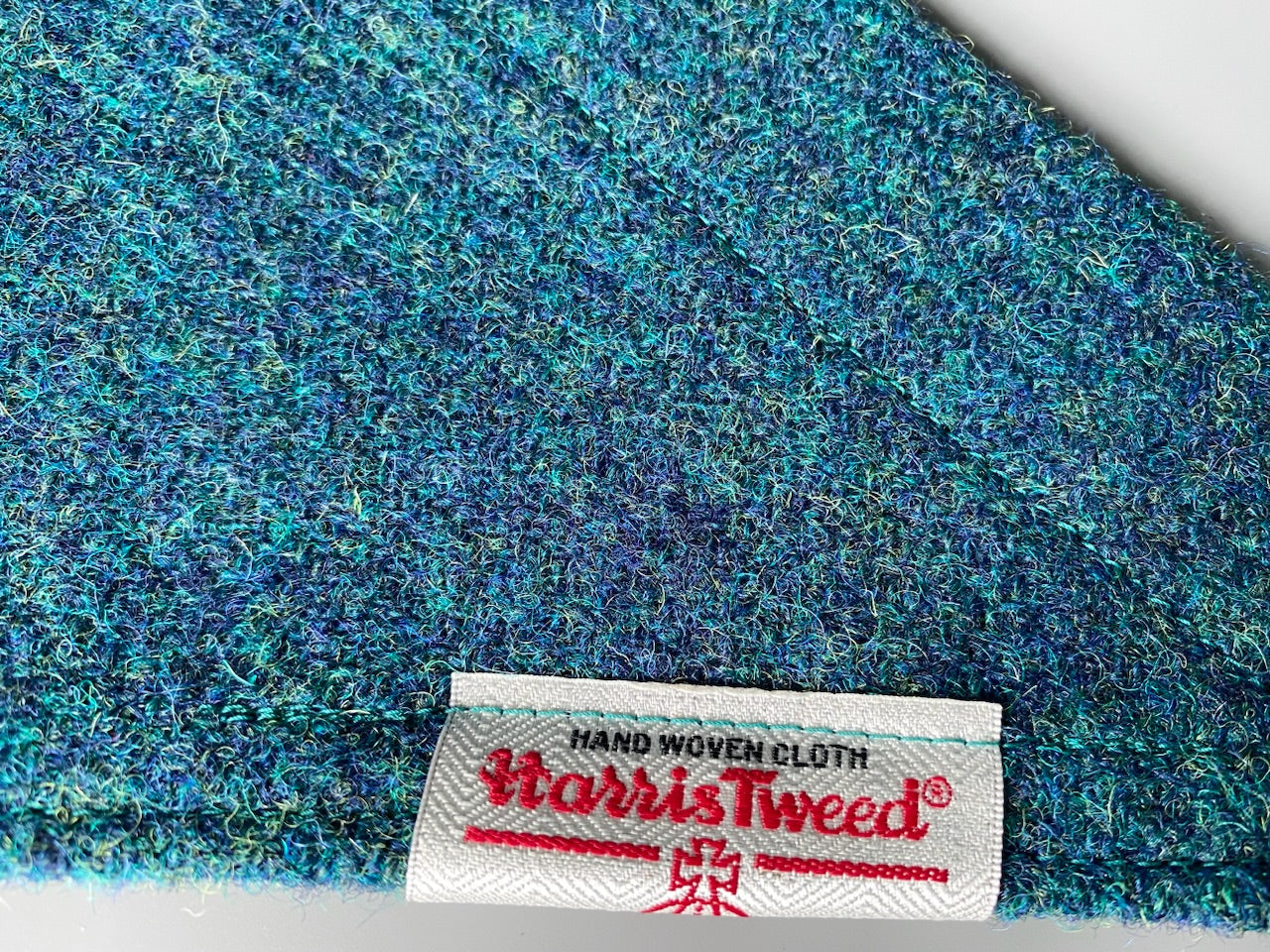 Harris Tweed dog bandana in a plain teal blue / green. Sizes S M L XL pet scarf