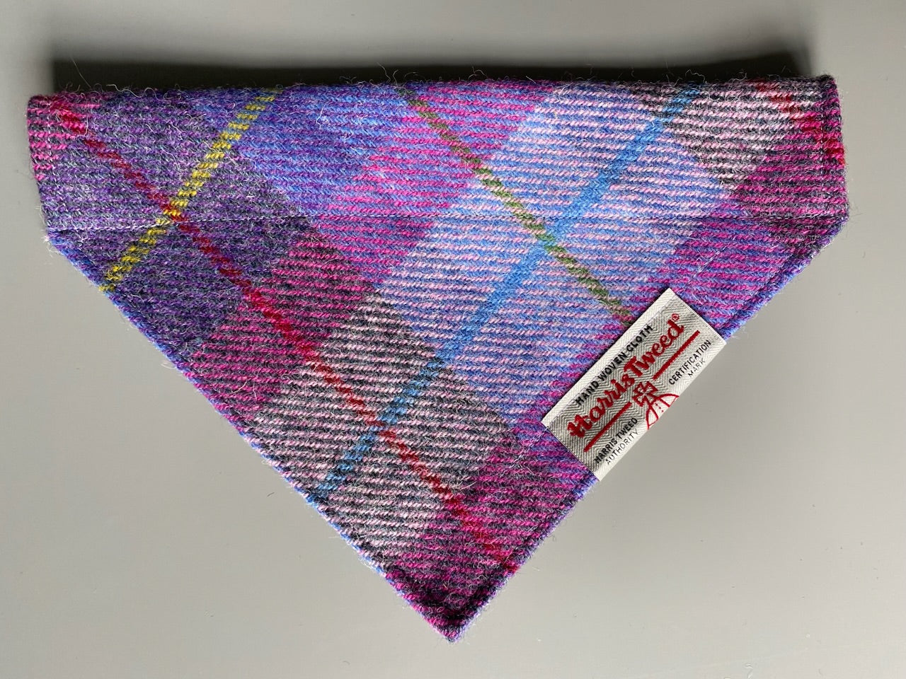 Harris Tweed dog bandana neckerchief in a pink, purple and blue check, tartan pattern. Sizes S M L XL pet scarf