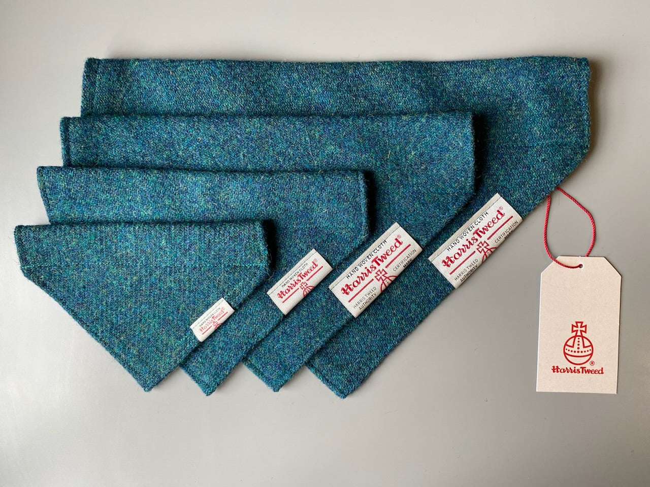 Harris Tweed dog bandana in a plain teal blue / green. Sizes S M L XL pet scarf