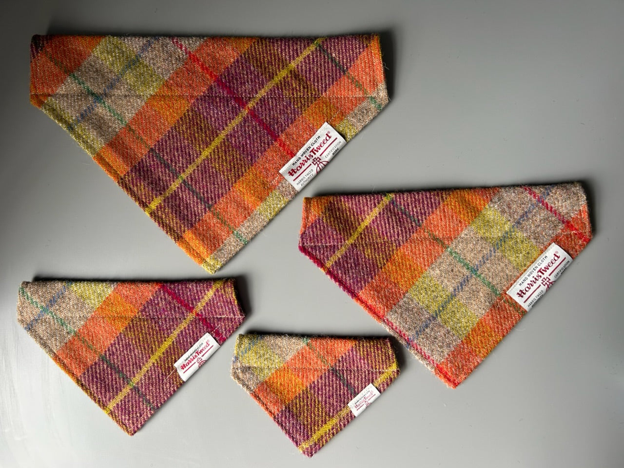 Harris Tweed dog bandana neckerchief in orange beige and purple in a check, tartan pattern. Sizes S M L XL pet scarf