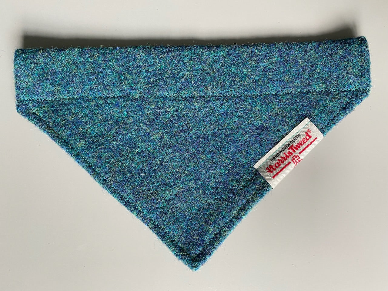 Harris Tweed dog bandana in a plain teal blue / green. Sizes S M L XL pet scarf