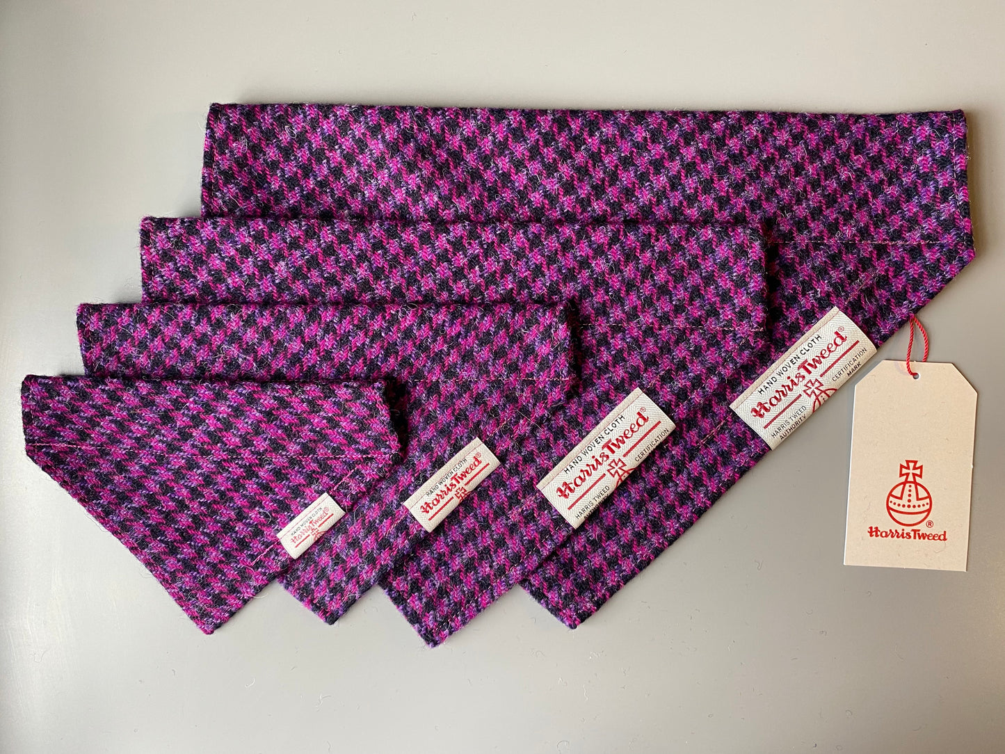 Harris Tweed dog bandana neckerchief in bright pink / purple and black in houndstooth dogtooth check pattern. Sizes S M L XL  pet scarf