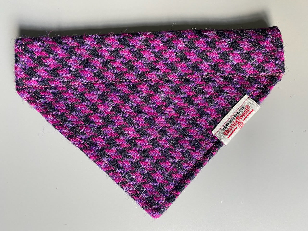 Harris Tweed dog bandana neckerchief in bright pink / purple and black in houndstooth dogtooth check pattern. Sizes S M L XL  pet scarf