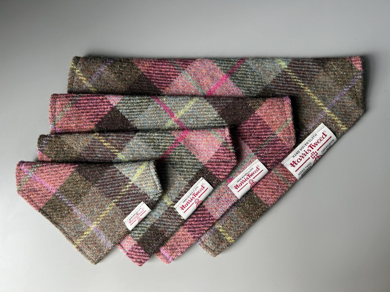 Harris Tweed dog bandana neckerchief in a pink and grey check, tartan pattern. Sizes S M L XL pet scarf