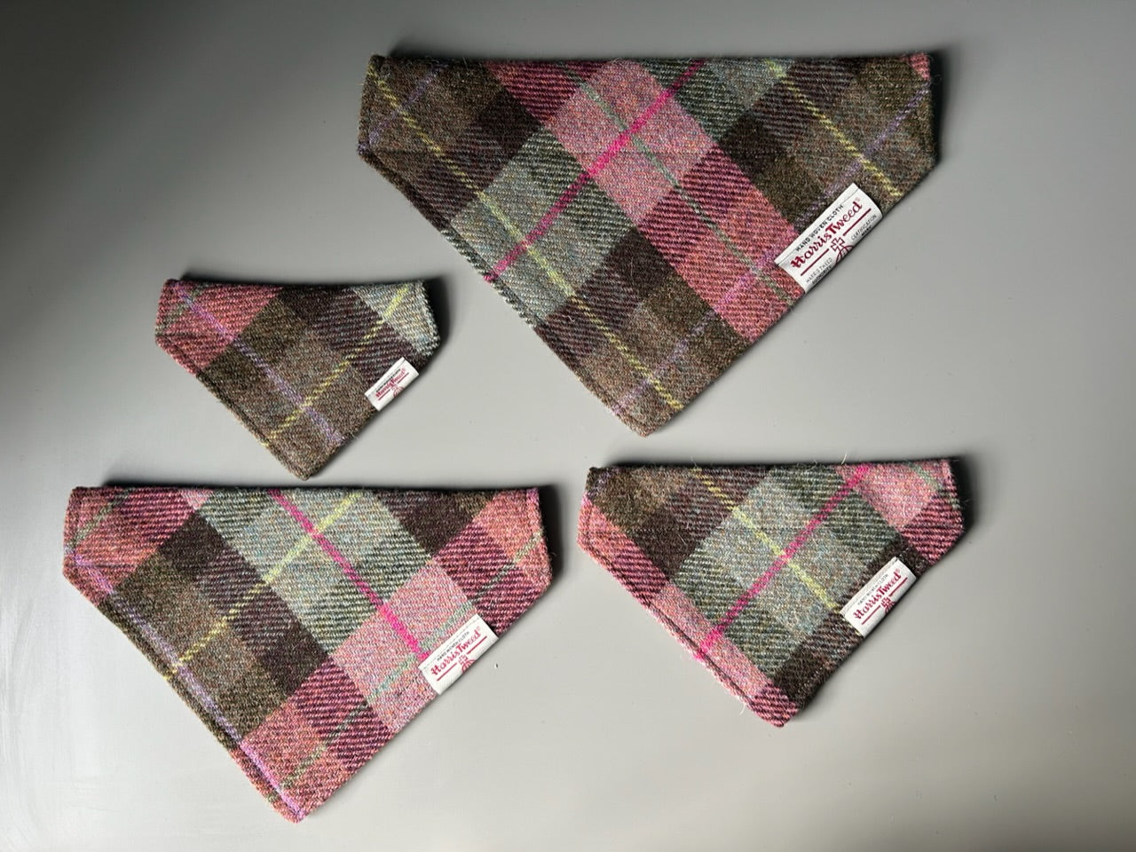 Harris Tweed dog bandana neckerchief in a pink and grey check, tartan pattern. Sizes S M L XL pet scarf