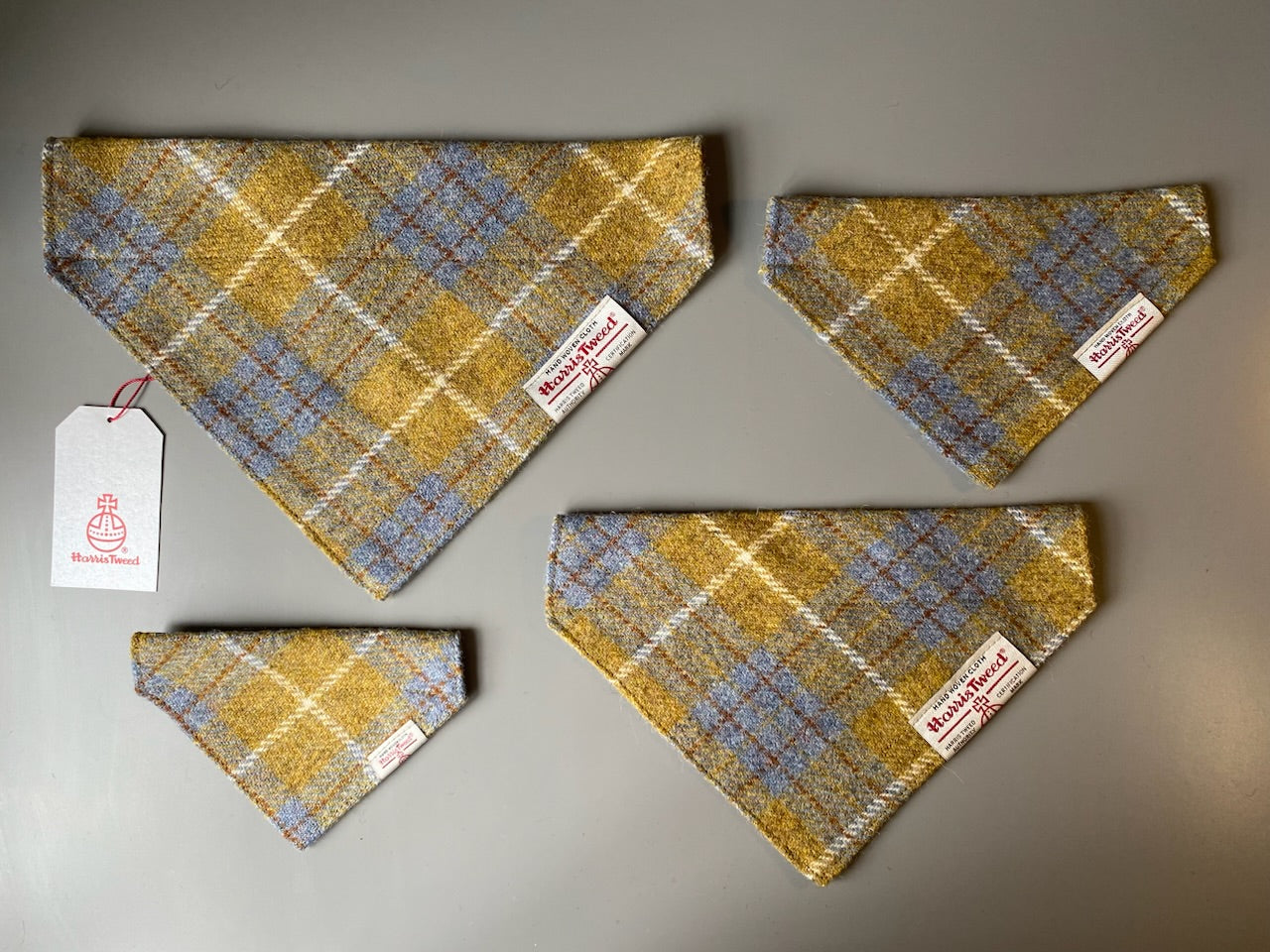 Harris Tweed dog bandana neckerchief in Mustard yellow / gold & blue check tartan or plaid pattern. Sizes S, M, L + XL pet scarf