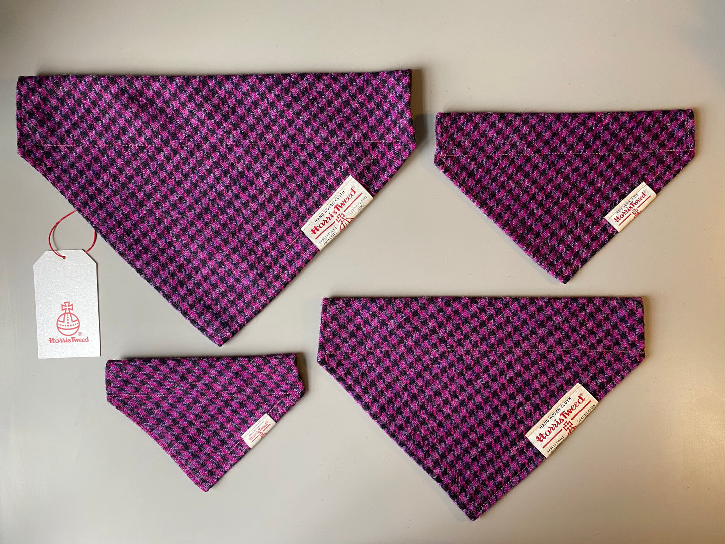 Harris Tweed dog bandana neckerchief in bright pink / purple and black in houndstooth dogtooth check pattern. Sizes S M L XL  pet scarf