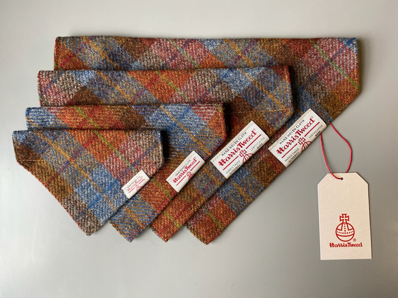 Harris Tweed dog bandana neckerchief in rust orange, blue & brown check tartan or plaid pattern. Sizes S, M, L + XL pet scarf