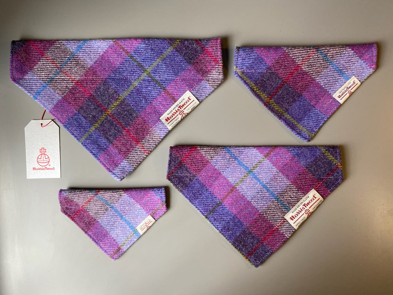 Harris Tweed dog bandana neckerchief in a pink, purple and blue check, tartan pattern. Sizes S M L XL pet scarf