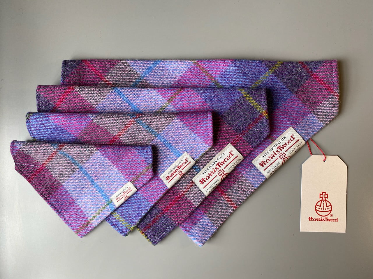 Harris Tweed dog bandana neckerchief in a pink, purple and blue check, tartan pattern. Sizes S M L XL pet scarf