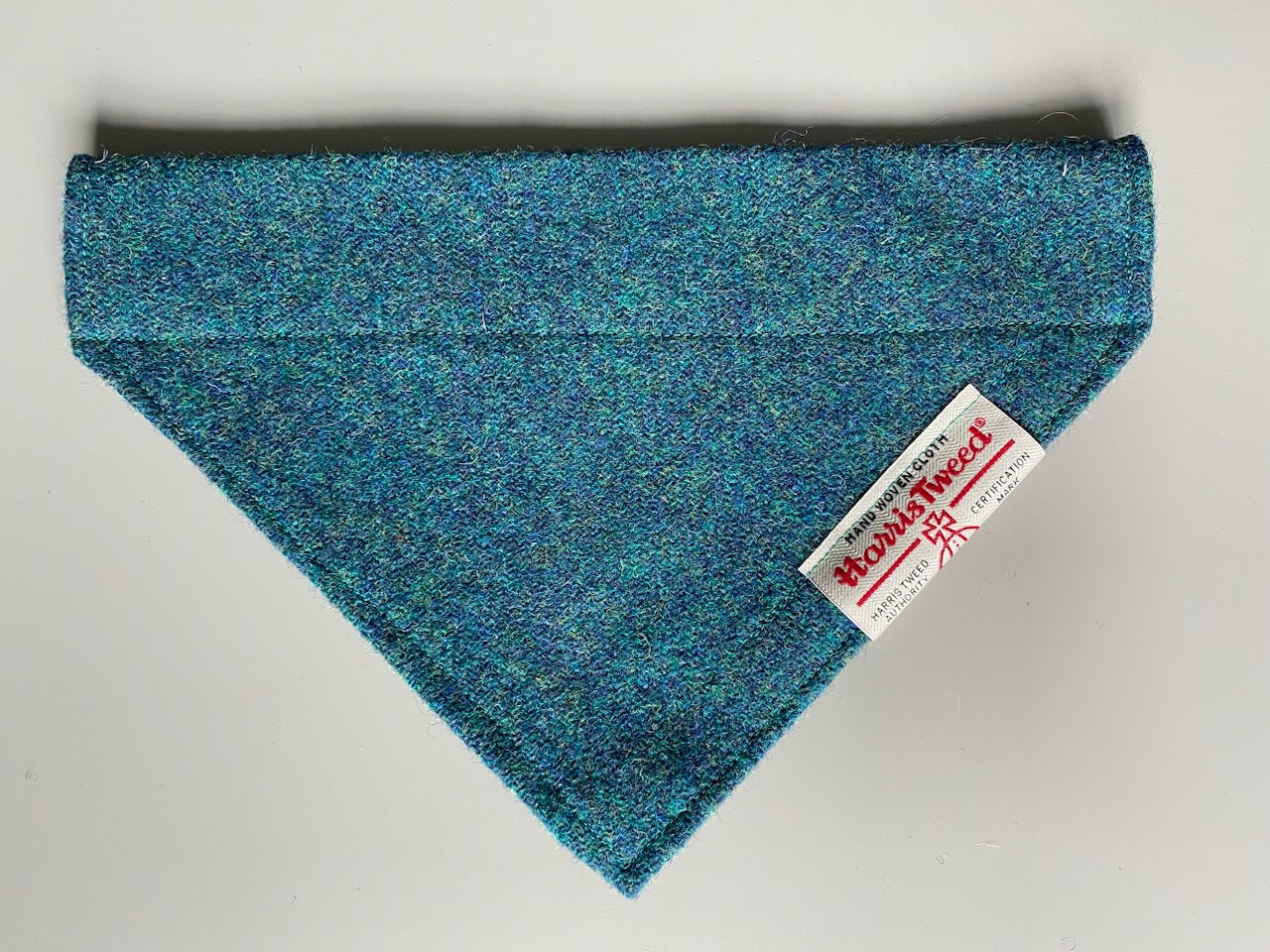 Harris Tweed dog bandana in a plain teal blue / green. Sizes S M L XL pet scarf