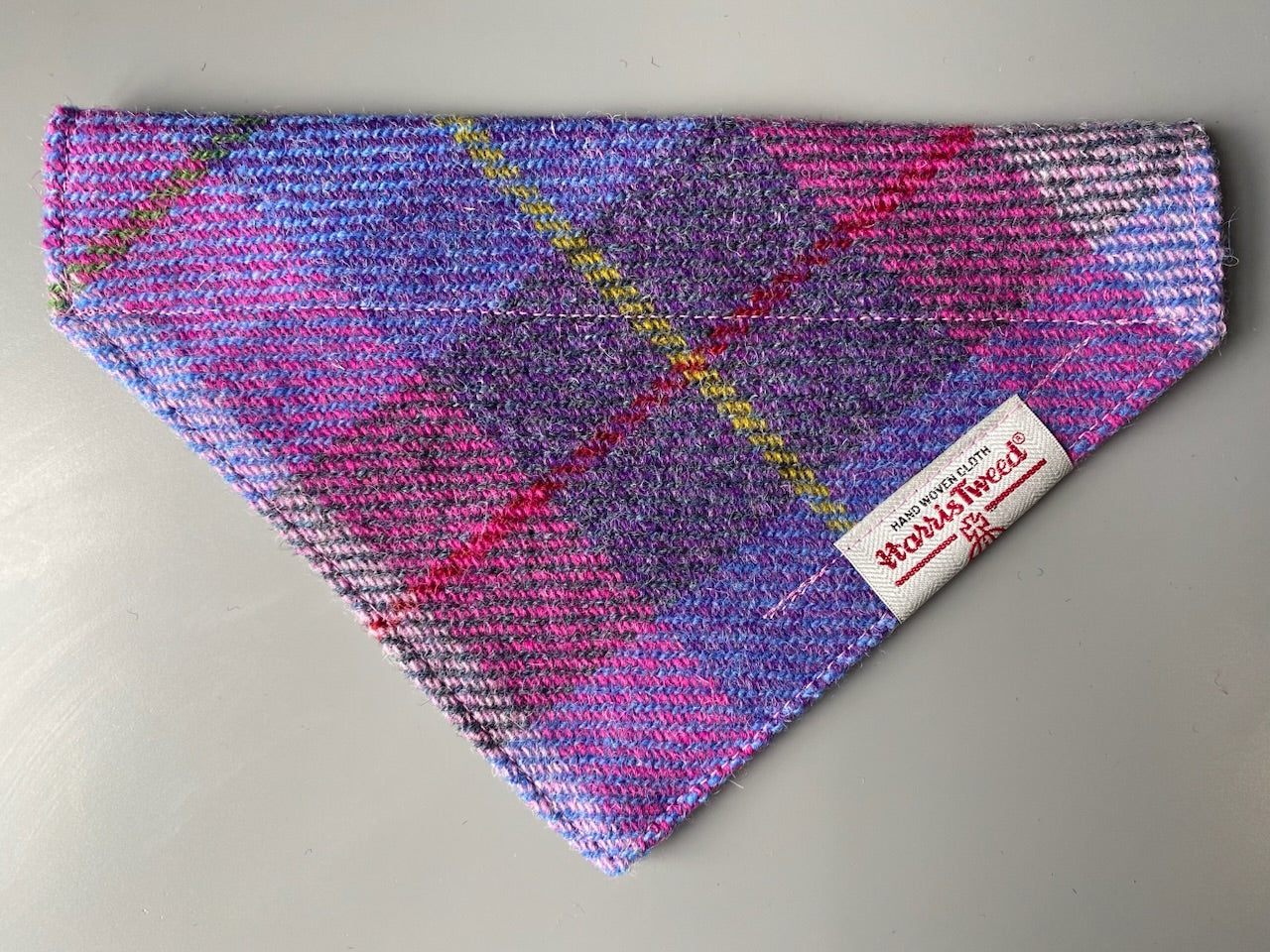 Harris Tweed dog bandana neckerchief in a pink, purple and blue check, tartan pattern. Sizes S M L XL pet scarf