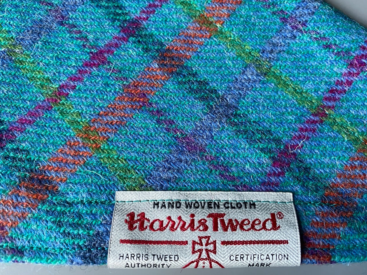 Harris Tweed dog bandana neckerchief in bright sky blue check tartan pattern. Sizes S M L XL pet scarf