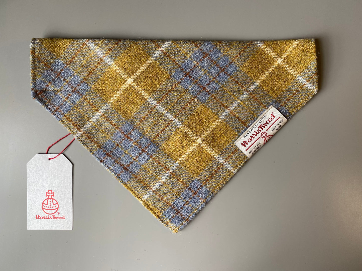 Harris Tweed dog bandana neckerchief in Mustard yellow / gold & blue check tartan or plaid pattern. Sizes S, M, L + XL pet scarf