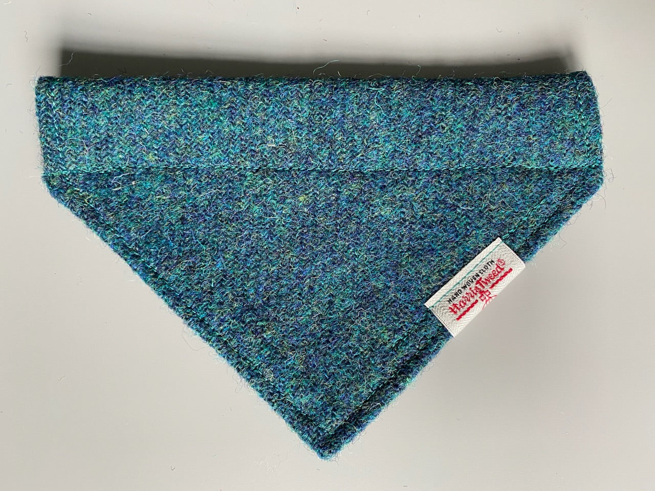 Harris Tweed dog bandana in a plain teal blue / green. Sizes S M L XL pet scarf