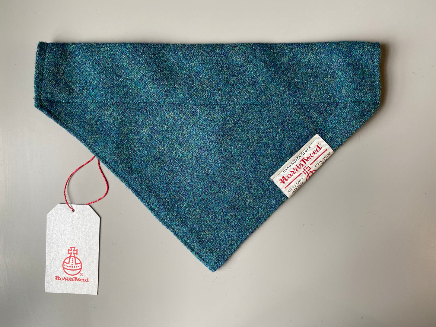 Harris Tweed dog bandana in a plain teal blue / green. Sizes S M L XL pet scarf