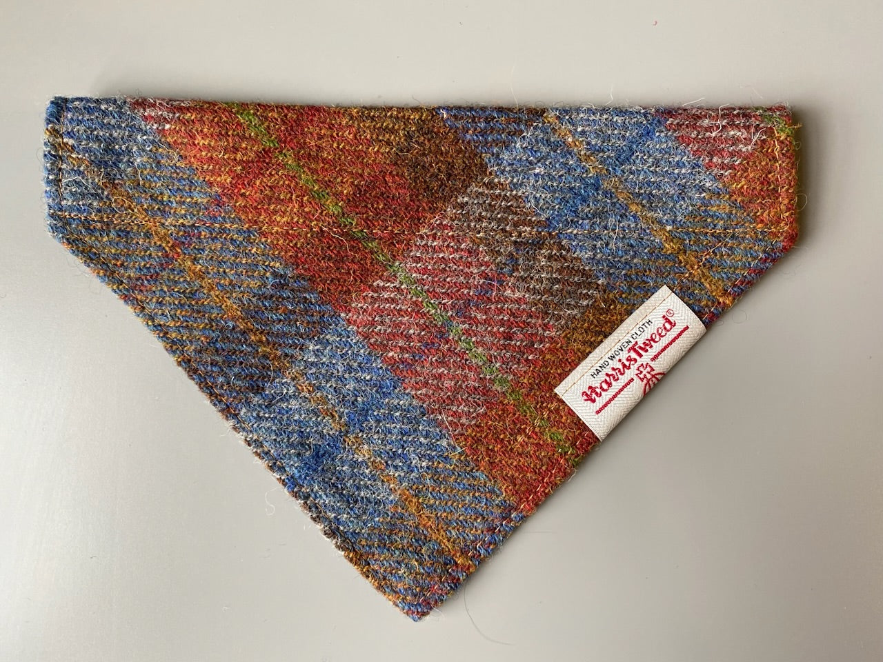 Harris Tweed dog bandana neckerchief in rust orange, blue & brown check tartan or plaid pattern. Sizes S, M, L + XL pet scarf